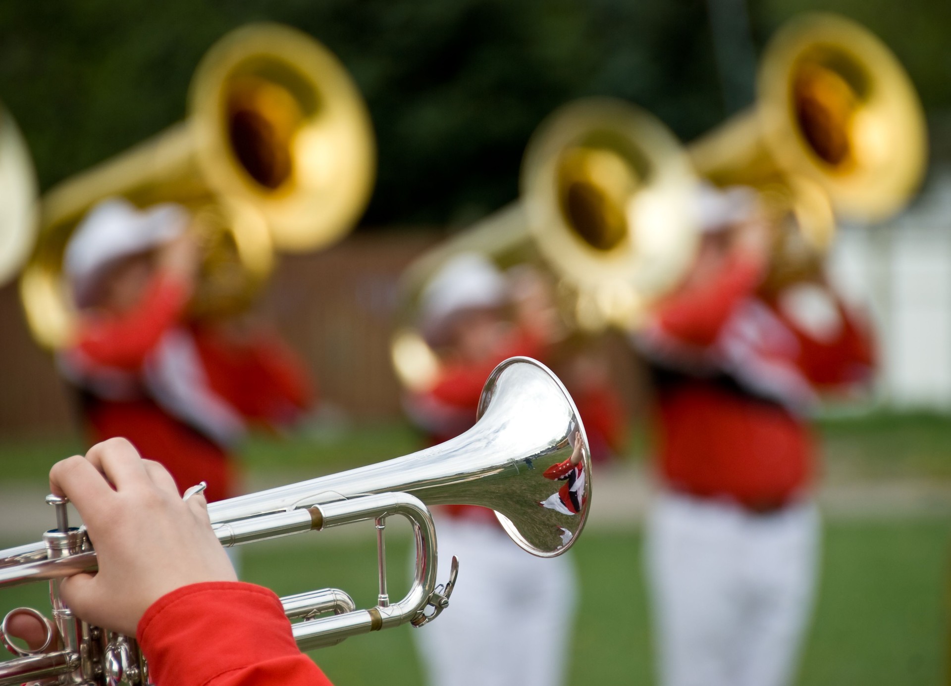Marching band trumpet close-up on field